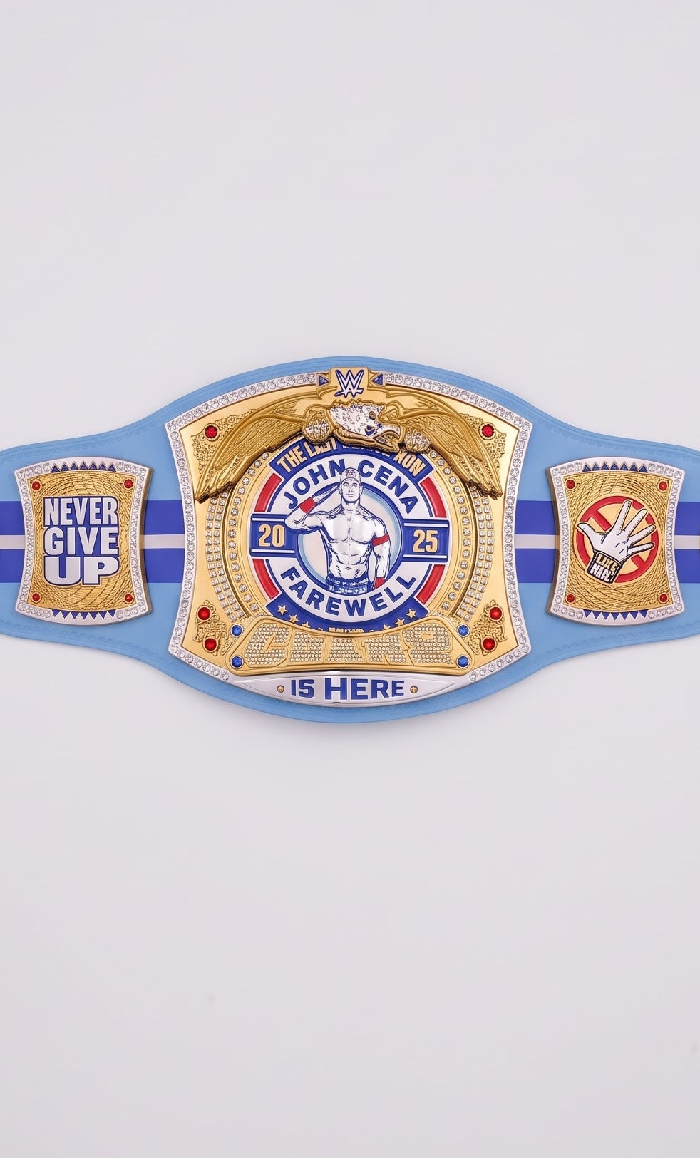 A custom blue and gold championship belt featuring the text '24th Annual Champion' and 'Never Give Up' on a light gray background.