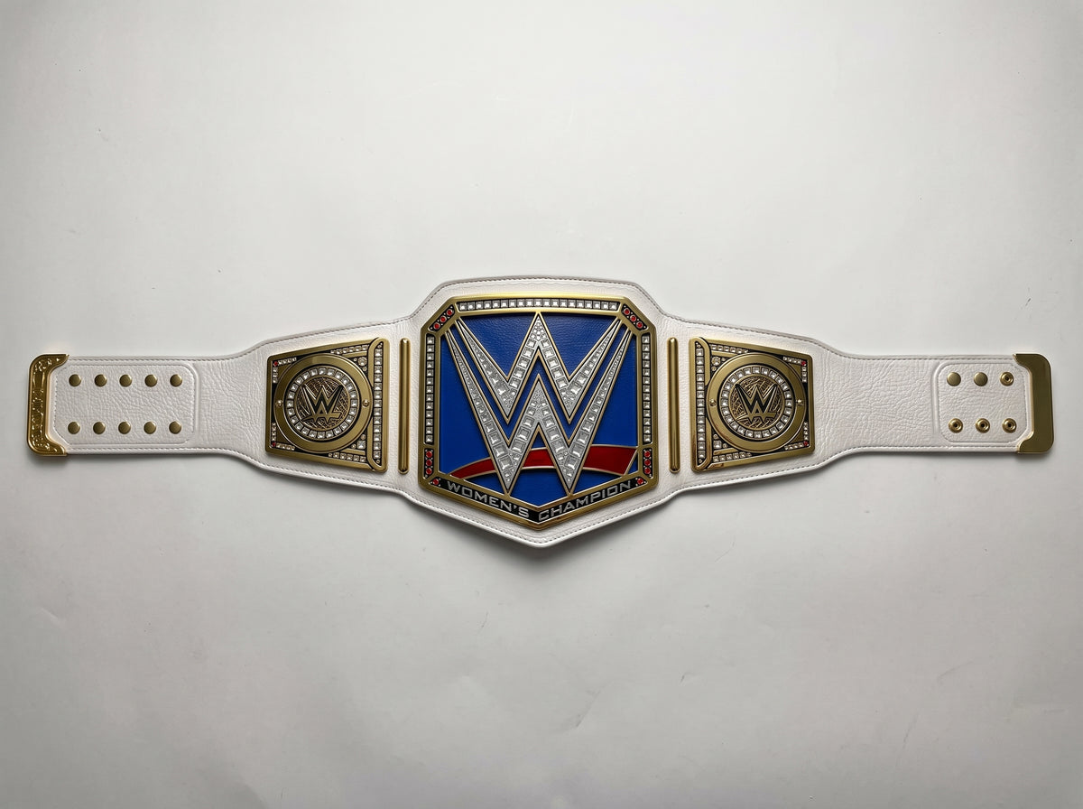 A WWE Championship belt featuring a white faux-leather strap with gold-tone hardware, a central blue and red panel with a silver WWE logo, and two side plates with gold detailing.