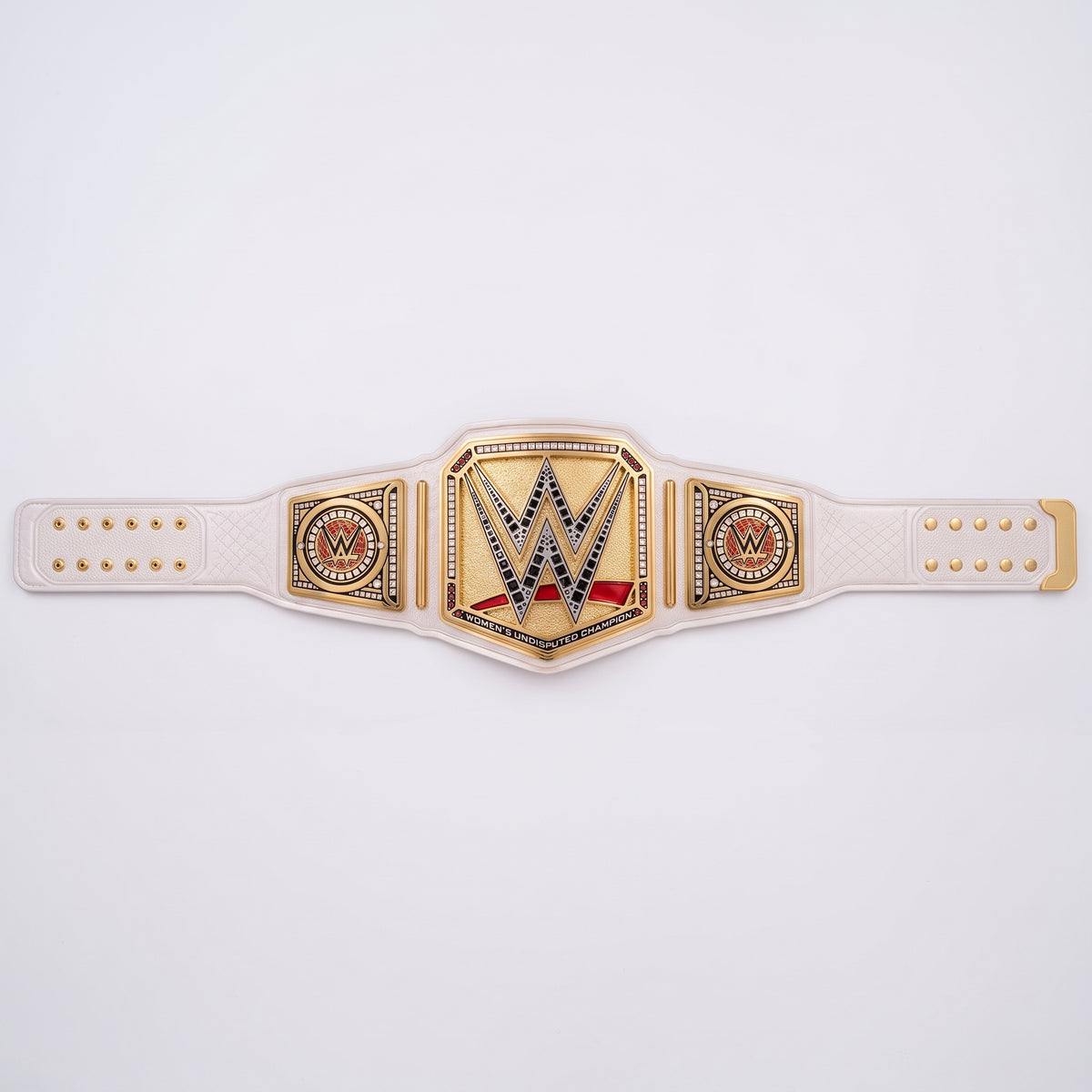 A WWE championship belt with a cream-colored strap and a gold-toned central plate featuring the WWE logo, displayed on a clean white background.