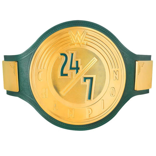 A green and gold WWE championship belt featuring a large gold central plate with the number 247 and a diagonal slash, surrounded by the word CHAMPION, with the WWE logo at the top. The belt has a dark green strap with gold side plates, shown against a plain white background.