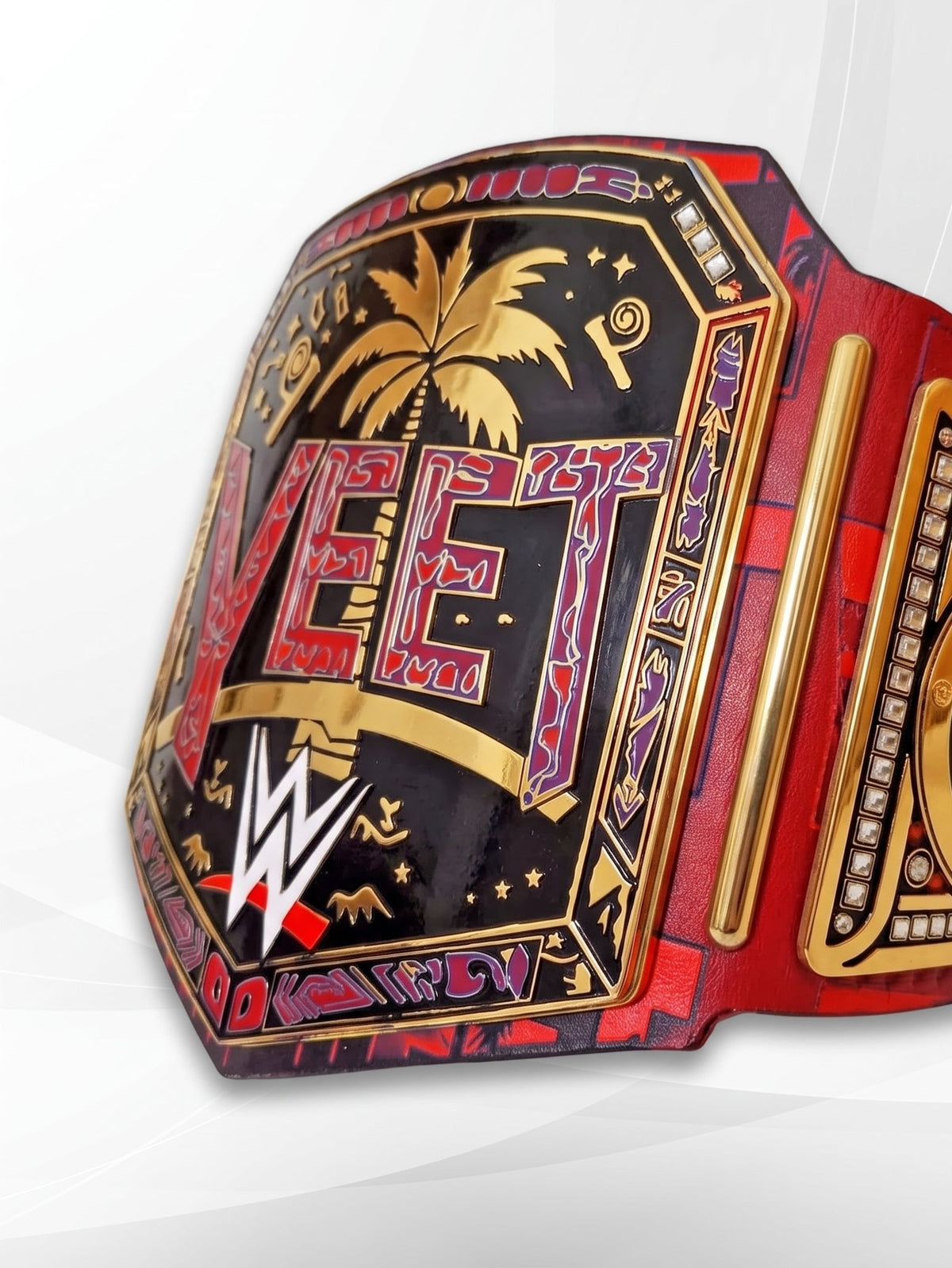 A WWE Raw Championship belt featuring a red and black design with gold trim, a palm tree, and the WWE logo, shown on a light gray background.