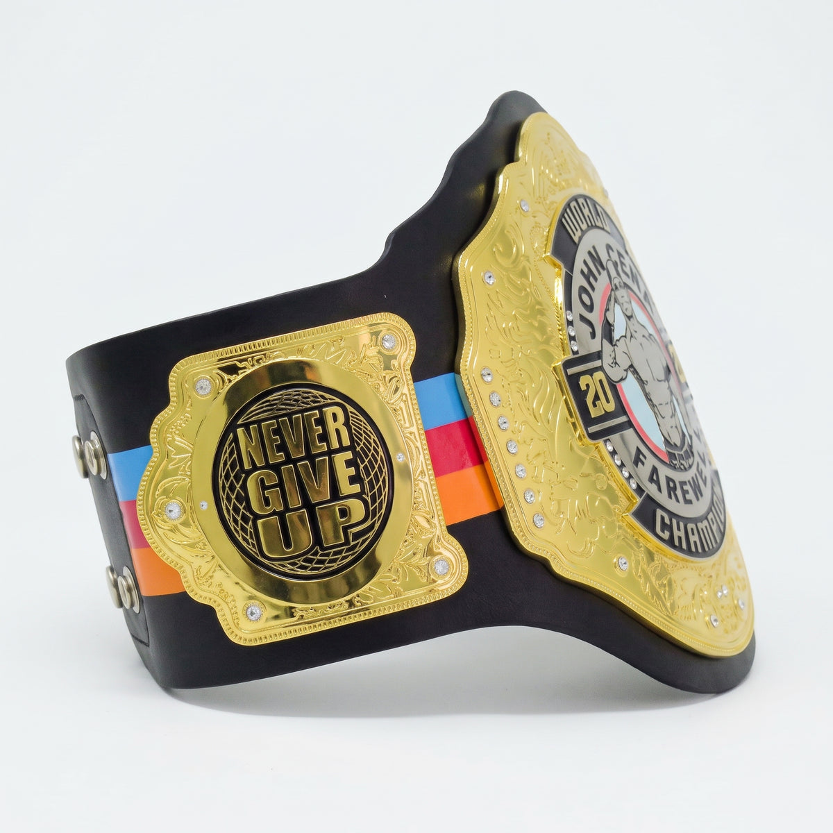 A black and gold championship belt with a colorful stripe detail, featuring a central plate that reads 'NEVER GIVE UP' and a side plate with a champion graphic and text, photographed on a white background.