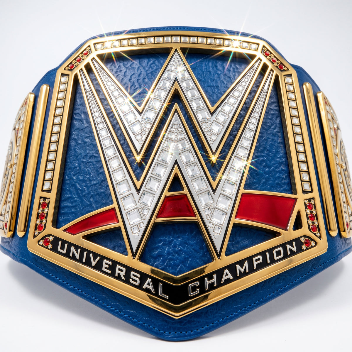 WWE Universal Champion belt featuring a large textured blue strap with gold-plated borders, a silver and white 'W' logo paved with clear stones, and red accents, with 'UNIVERSAL CHAMPION' text at the bottom.