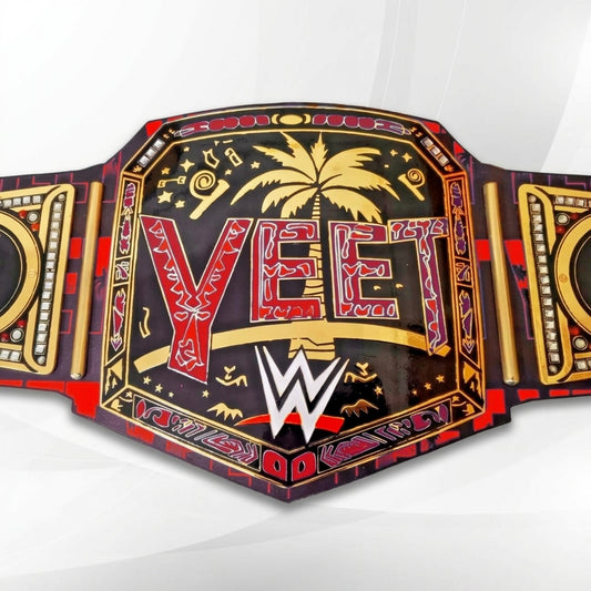 A WWE VET championship belt with a black, red, and gold design featuring a palm tree, stars, and the WWE logo, shown on a light gray background.