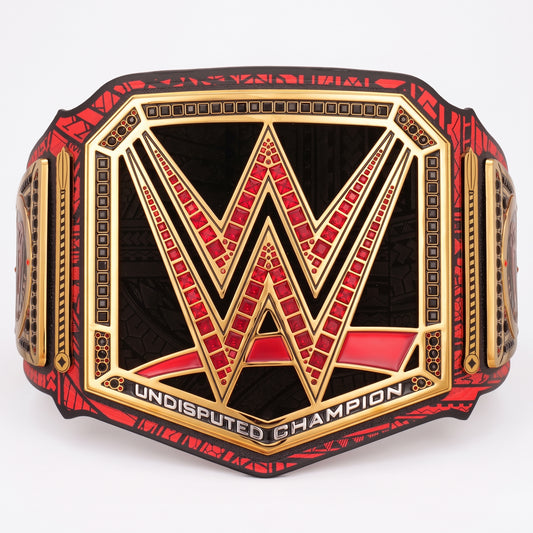 A WWE Undisputed Champion belt featuring a large central gold 'W' logo outlined in red and black, with 'UNDISPUTED CHAMPION' text along the bottom, shown on a plain white background.