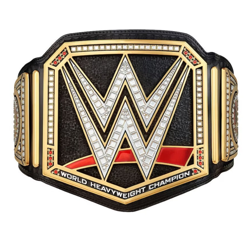 WWE World Heavyweight Championship belt featuring a large gold-plated central plate with a silver 'W' outlined in black, accented with red enamel and clear rhinestones, on a black leather strap.