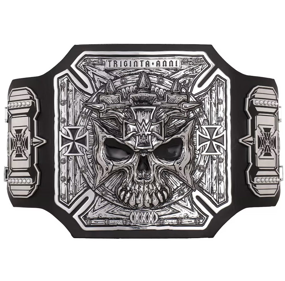 A black and silver WWE championship belt featuring a detailed skull design with the text 'TRIGINTA ANNI' and the WWE logo, shown against a plain white background.