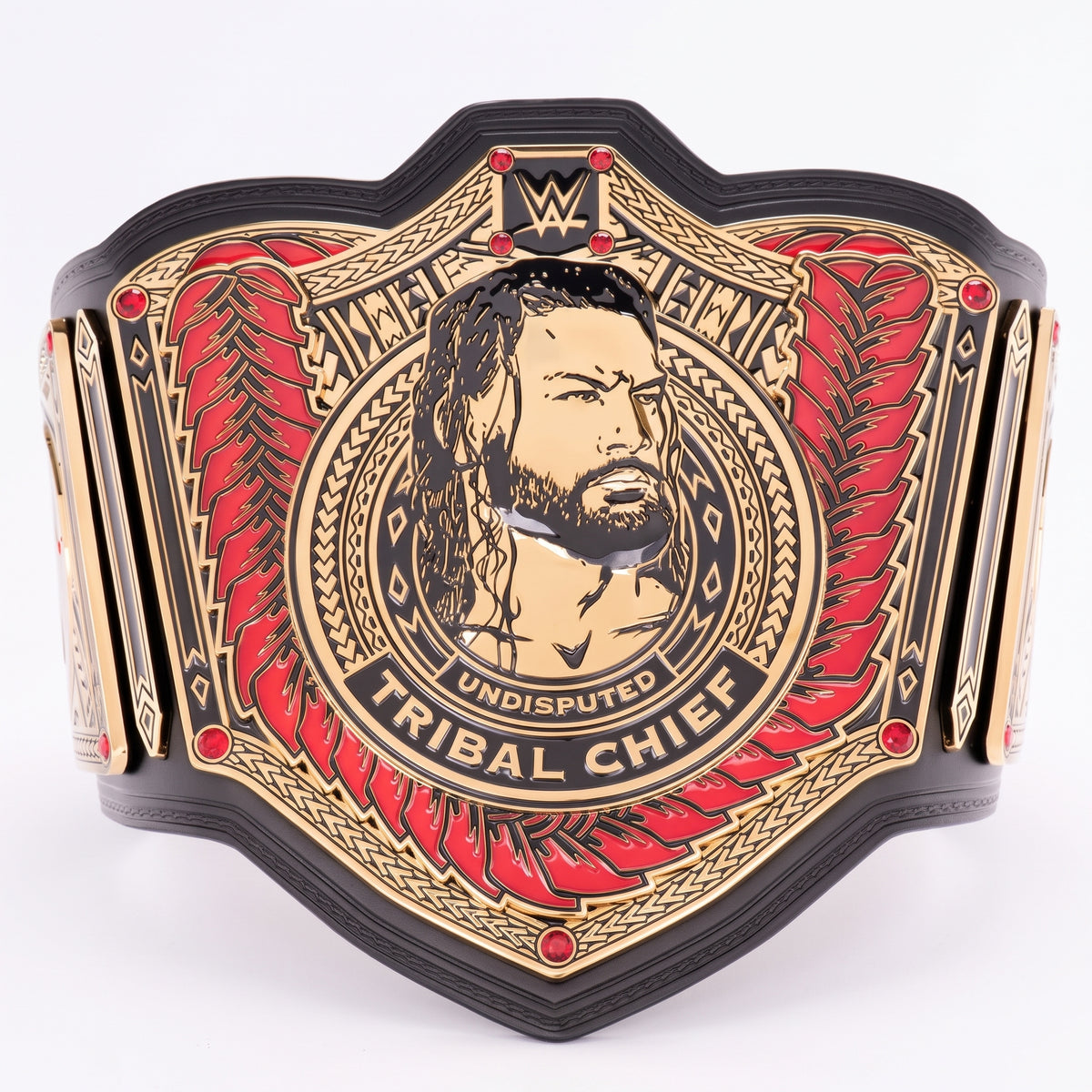 A WWE Undisputed Tribal Chief championship belt featuring a gold and black design with red wing accents, a portrait of a bearded man in the center, and red gemstone details, photographed on a white background.